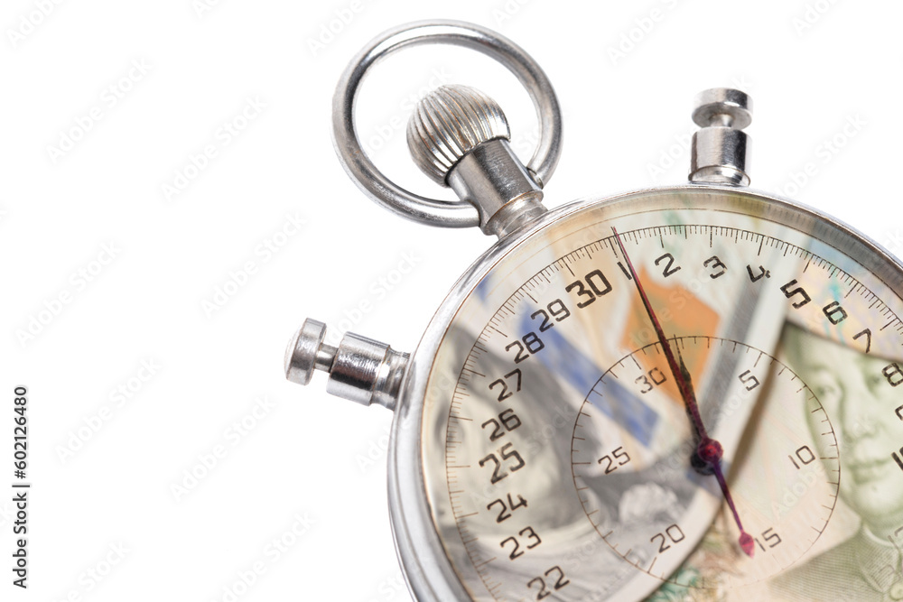 Stopwatch with International currencies inside. Time is money concept