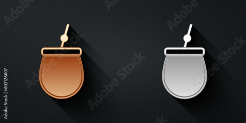 Gold and silver Mate tea icon isolated on black background. Long shadow style. Vector