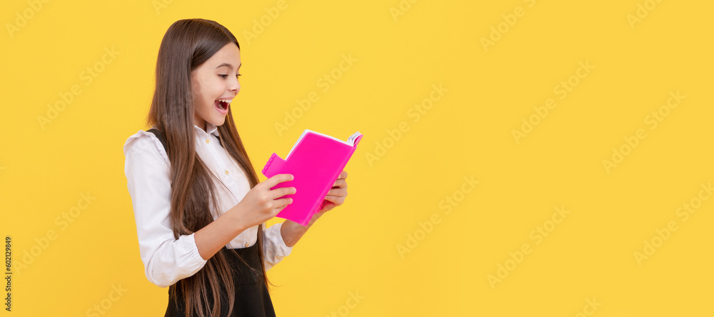 surprised teen girl in school uniform reading book, book lover. Portrait of schoolgirl student, banner header. School child face isolated panorama background with copy space. surprised teen girl in school uniform reading book, book lover. Portrait of schoolgirl student, banner header. School child face isolated panorama background with copy space.