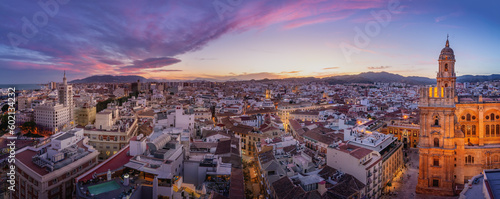 Panoramic aerial view with Malaga Cathedral at sunset - Malaga, Andalusia, Spain