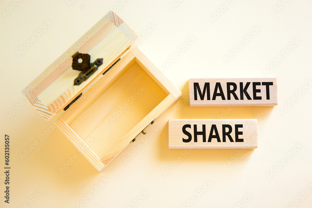 Market share symbol. Concept words Market share on beautiful wooden block. Beautiful white table white background. Empty wooden chest. Business and Market share concept. Copy space. Market share symbol. Concept words Market share on beautiful wooden block. Beautiful white table white background. Empty wooden chest. Business and Market share concept. Copy space.