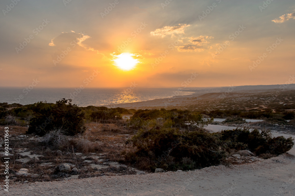 View of the sunset and the sea from cape greco on the island of cyprus