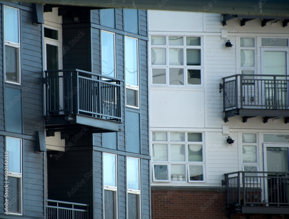 Fototapeta premium Tall windows in new apartment buildings in Redmond town center - 3
