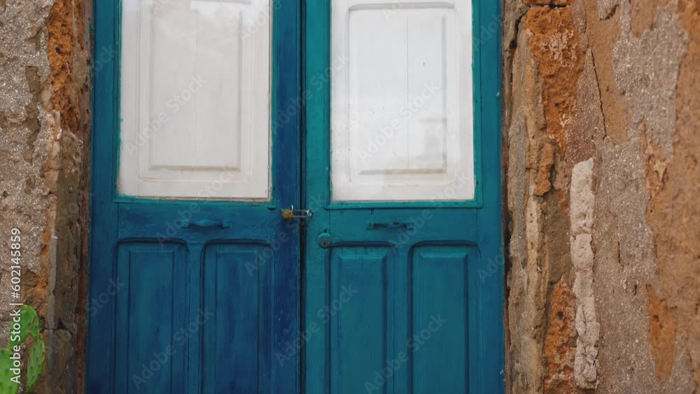 Door blue painted in rustic house in Sicily city Marzamemi Door blue painted in rustic house in Sicily city Marzamemi