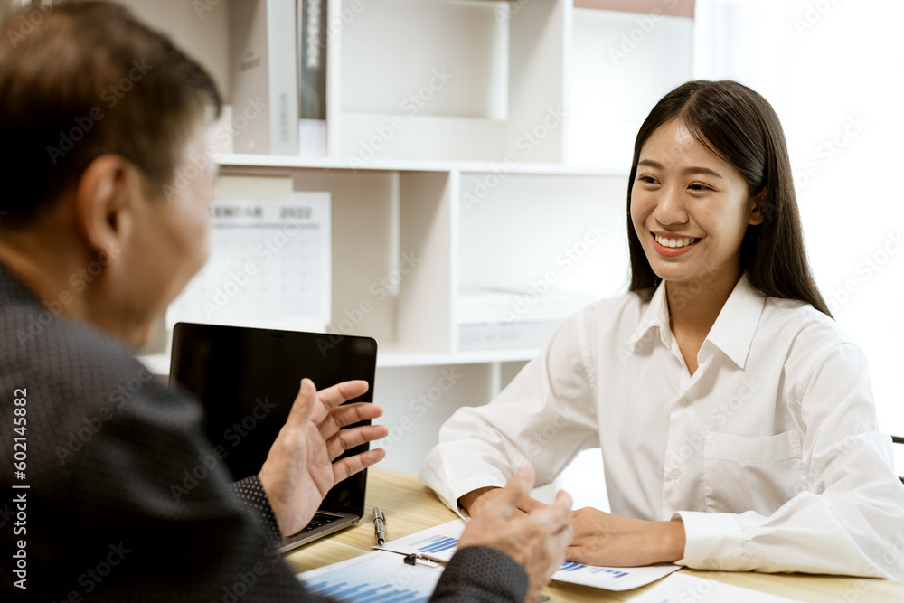 businessman explaining or teaching coach training to businesswoman