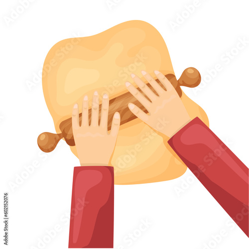 Hands roll out the dough with a rolling pin
