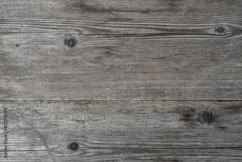 Texture of an old wooden board. Light vintage back.