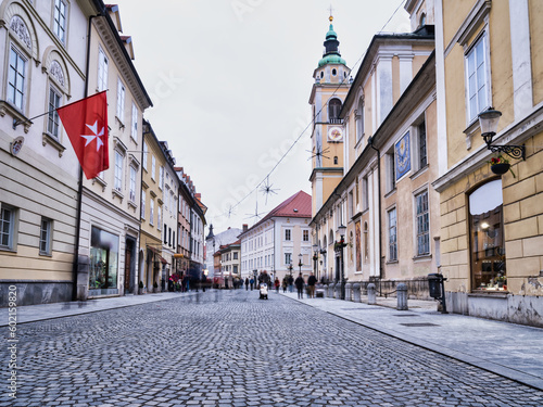 Ciril-Metodov trg, a Cobblestone street and Cathedral tower in Ljubljana old town, Slovenia
