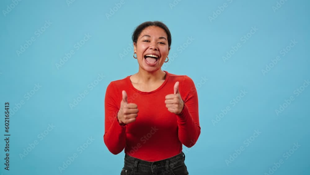 Young African American woman claps hands in support Young African American woman claps hands in support