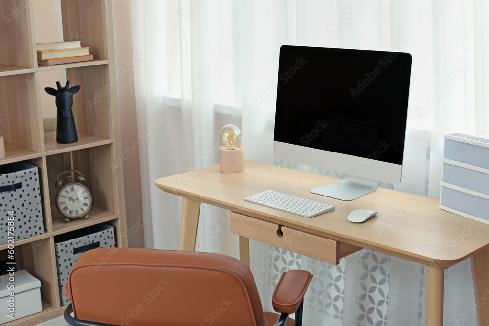 Fototapeta premium Modern teenager's room interior with stylish workplace