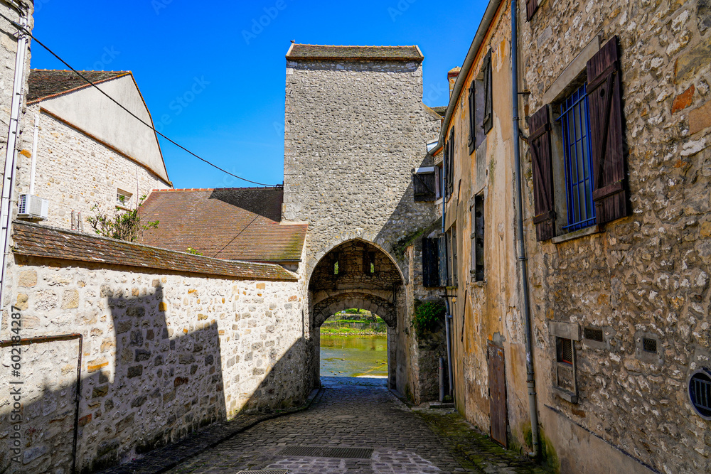 Postern in the medieval walled town of Moret-sur-Loing in Seine et Marne, France - It was a gate in the fortifications allowing carts with cattle to go drink at the river