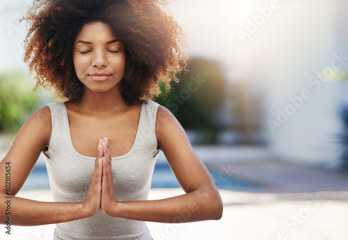 Calm woman, hands and yoga in meditation for zen, spiritual wellness or healthy exercise outdoors. African female meditating in relax, mind or awareness for mental health and wellbeing on mockup