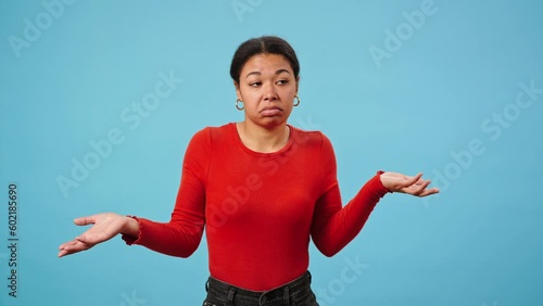 Woman listens carefully and shakes head showing ignorance