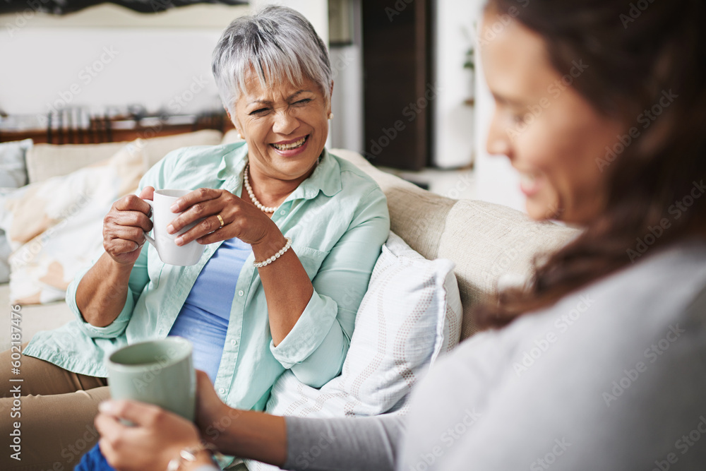 Laugh, coffee and mother with daughter on sofa in living room for bonding, conversation and happiness. Smile, chat and discussion with women talking in family home for generations, reunion and break Laugh, coffee and mother with daughter on sofa in living room for bonding, conversation and happiness. Smile, chat and discussion with women talking in family home for generations, reunion and break