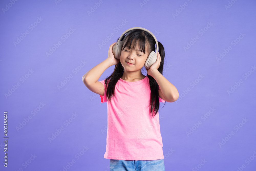 beautiful asian girl portrait posing on purple background beautiful asian girl portrait posing on purple background