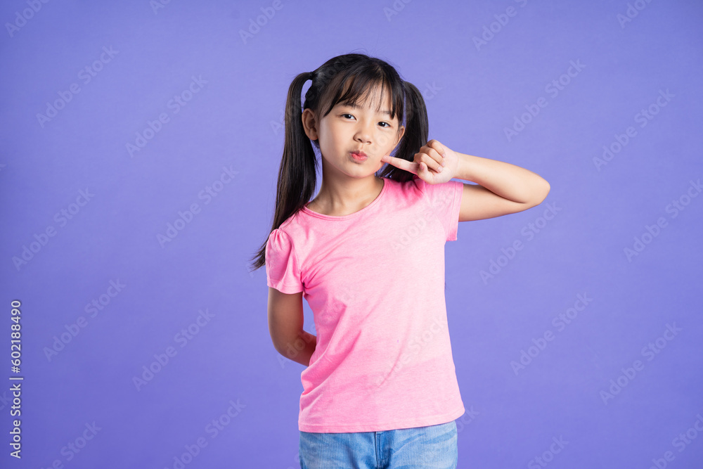 beautiful asian girl portrait posing on purple background beautiful asian girl portrait posing on purple background
