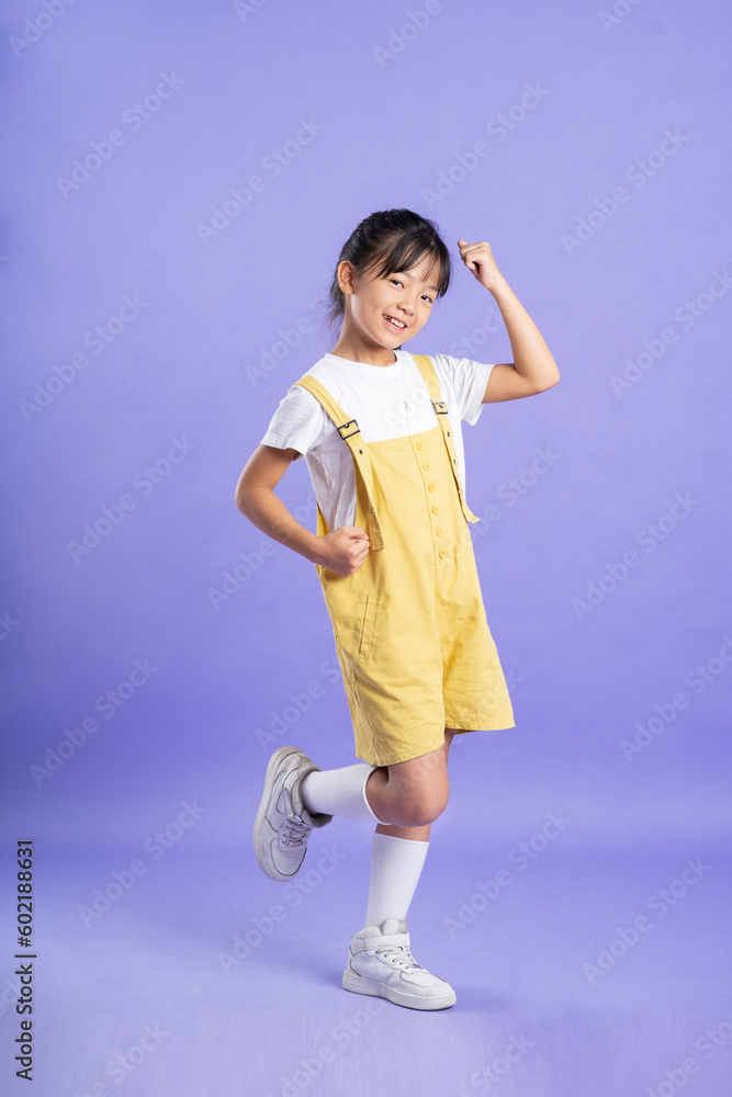 cute asian baby girl posing on purple background cute asian baby girl posing on purple background