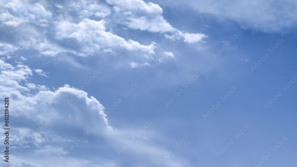 Obraz premium Blue sky with fluffy cloud. Beautiful sky in the morning. The concept of the freedom of life, never give up and new life beginning.