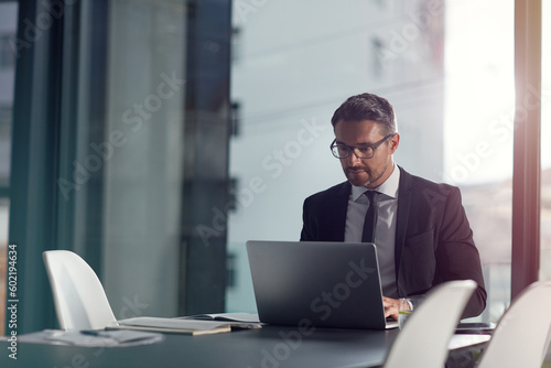 Computer, working and business man in office or conference room schedule, agenda and management software. Typing, career research and workflow planning of professional or CEO person on laptop