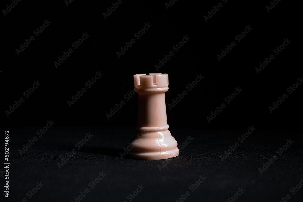 chess pieces on a black background chess pieces on a black background