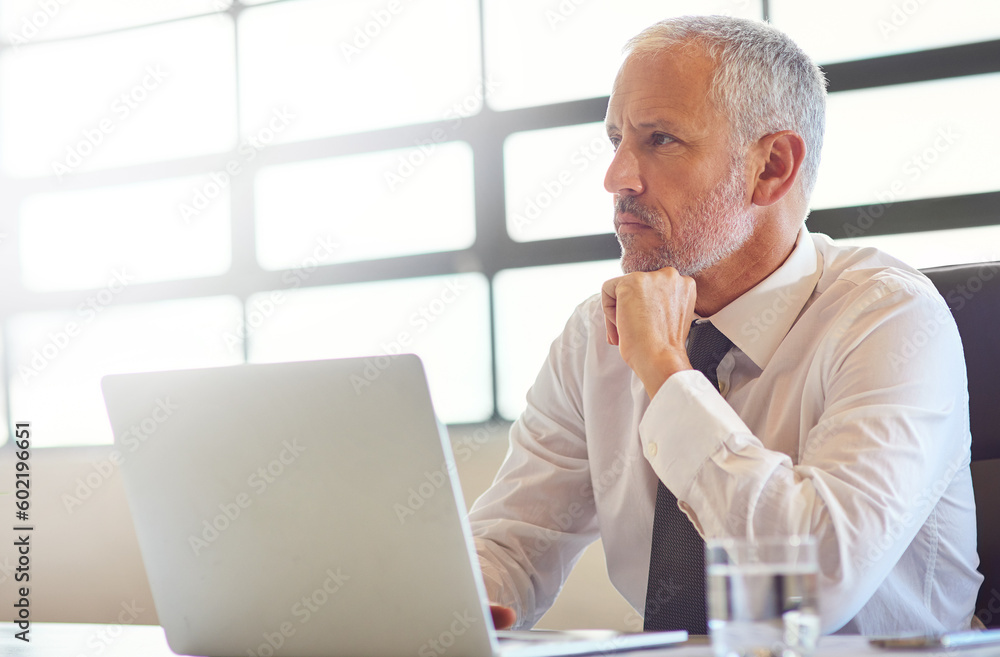 Laptop, thinking and research with a business man in the office, working online to finish a project at his desk. Computer, idea and email with a mature male manager at work for company opportunity Laptop, thinking and research with a business man in the office, working online to finish a project at his desk. Computer, idea and email with a mature male manager at work for company opportunity