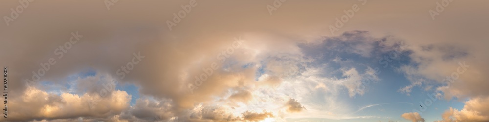 360 sky panorama of vibrant golden Cumulus clouds at sunset, seamless hdr equirectangular format. Full zenith for 3D visualization and sky replacement. Nature, weather and climate change concept