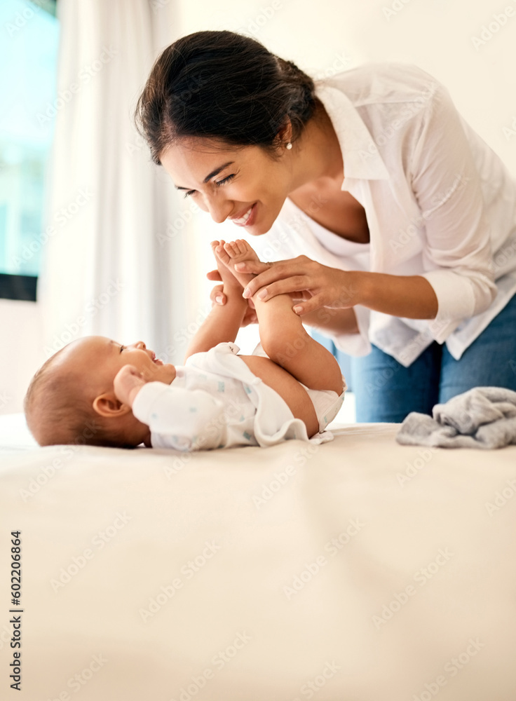 Smile, love and a mother with her baby in the bedroom of their home together for playful bonding. Family, kids and a happy young mama spending time with her newborn infant on the bed for fun or joy Smile, love and a mother with her baby in the bedroom of their home together for playful bonding. Family, kids and a happy young mama spending time with her newborn infant on the bed for fun or joy