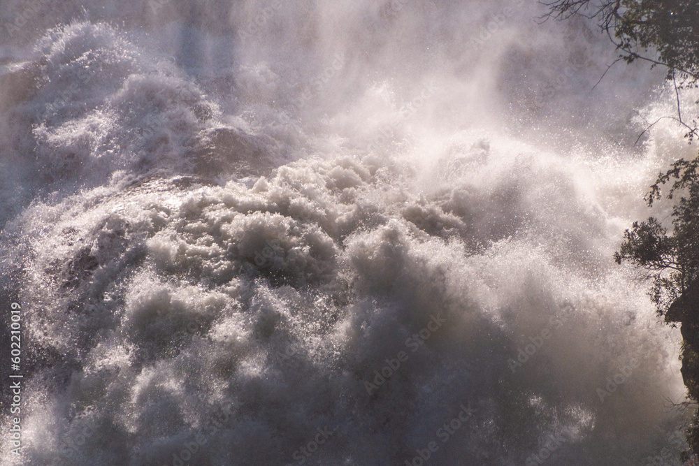 Detail of the roaring waters thundering down victoria falls, in Zimbabwe.
