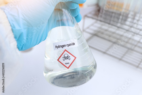 Hydrogen cyanide Solution, Hazardous chemicals and symbols on containers photo