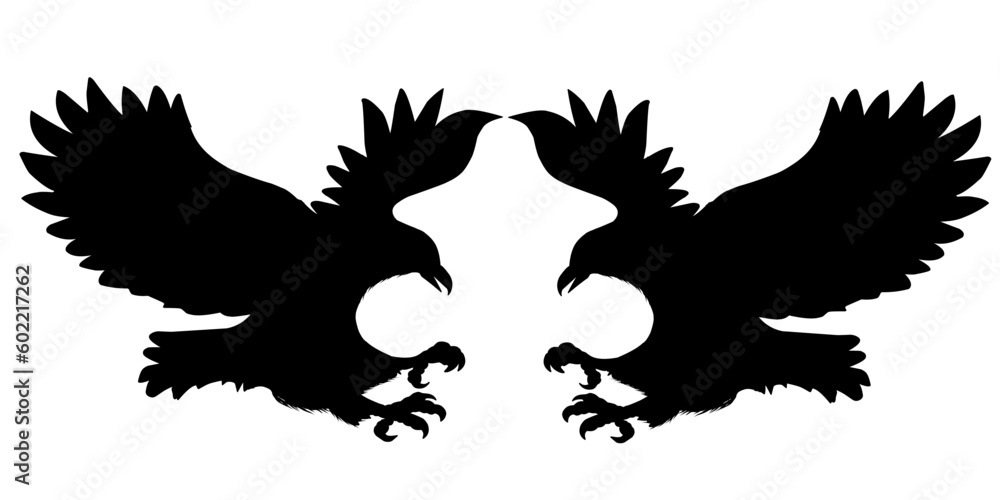 silhouettes of two eagles facing each other silhouettes of two eagles facing each other
