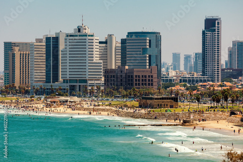 Modern buildings and promenade along Mediterranean sea in Tel Aviv, Israel.