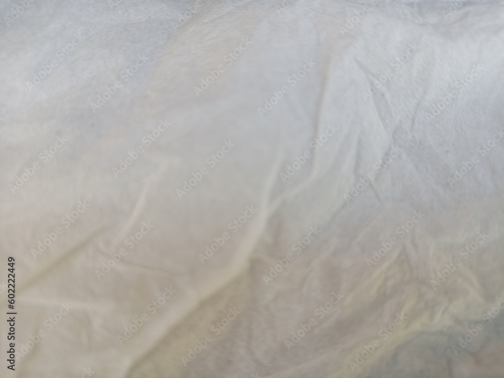 Naklejka premium White Linen background Crumpled tissue Natural handmade tissue background Eco Organic top view White tissue linen texture