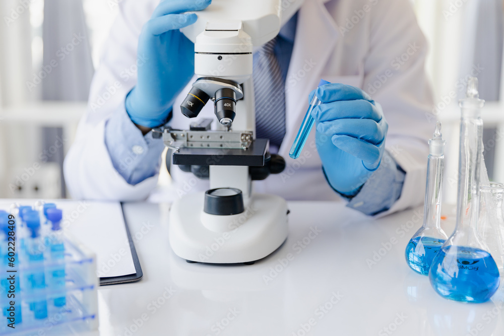 Healthcare researchers working in life science labs. Medical Science Technology Research for Vaccine Testing vaccine against coronavirus virus covid 19 cure Healthcare researchers working in life science labs. Medical Science Technology Research for Vaccine Testing vaccine against coronavirus virus covid 19 cure