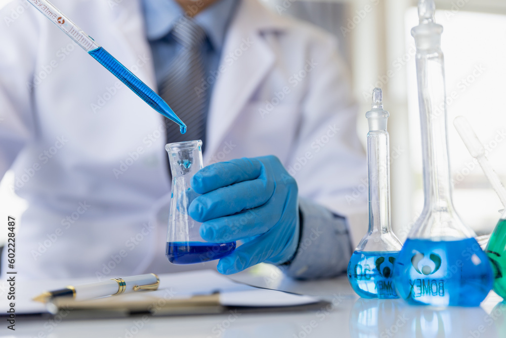 Fototapeta premium Healthcare researchers working in life science labs. Medical Science Technology Research for Vaccine Testing vaccine against coronavirus virus covid 19 cure