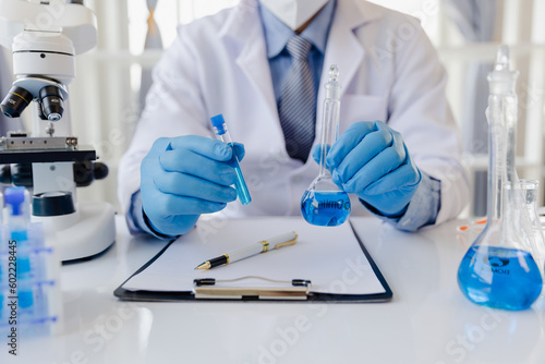 Healthcare researchers working in life science labs. Medical Science Technology Research for Vaccine Testing vaccine against coronavirus virus covid 19 cure