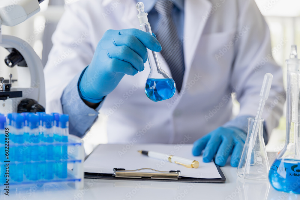 Healthcare researchers working in life science labs. Medical Science Technology Research for Vaccine Testing vaccine against coronavirus virus covid 19 cure Healthcare researchers working in life science labs. Medical Science Technology Research for Vaccine Testing vaccine against coronavirus virus covid 19 cure