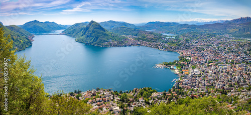 Panoramic view of Lugano town and Lugano Lake from Monte Bre mountain. photo