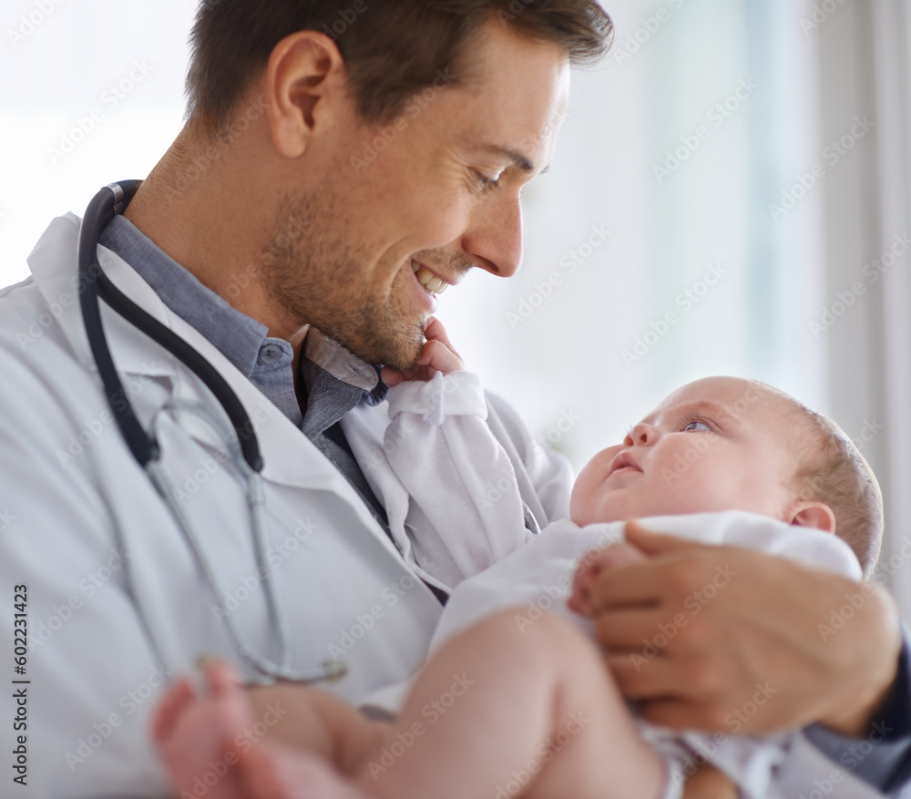 Happy male doctor, pediatrician and holding baby for hospital assessment, medical support and growth. Pediatrics, physician and carrying newborn kid in clinic, healthcare service and helping children Happy male doctor, pediatrician and holding baby for hospital assessment, medical support and growth. Pediatrics, physician and carrying newborn kid in clinic, healthcare service and helping children