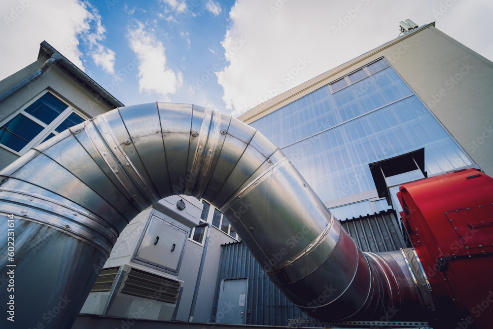 Fototapeta premium Modern steam pipeline for industrial on blue skies background.