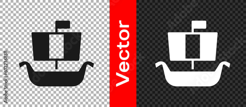 Black Ancient viking scandinavian drakkar icon isolated on transparent background. Viking transport ship. Vector