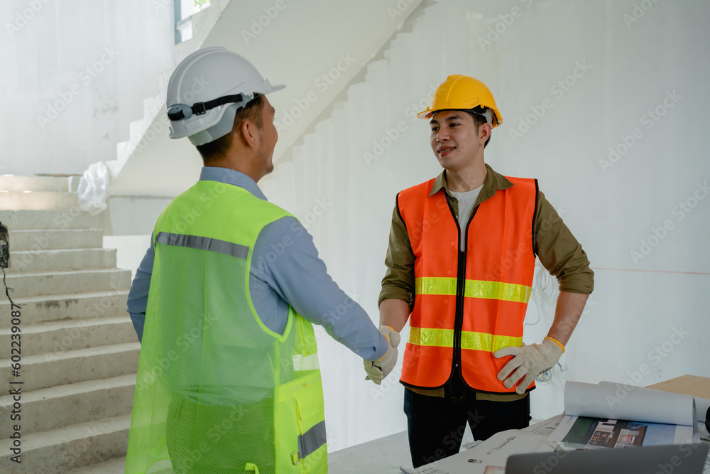 multi ethnic engineer brainstorming with deal and measuring for cost estimating on paperworks and floor plan drawings, contract and agreement concepts multi ethnic engineer brainstorming with deal and measuring for cost estimating on paperworks and floor plan drawings, contract and agreement concepts