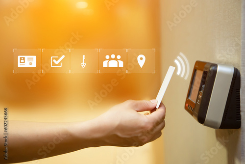 Φωτογραφία Proximity card reader door unlock, Hand security man using ID card on fingerprint scanning access control system for identity verification to open the door or for security safety or check attendance