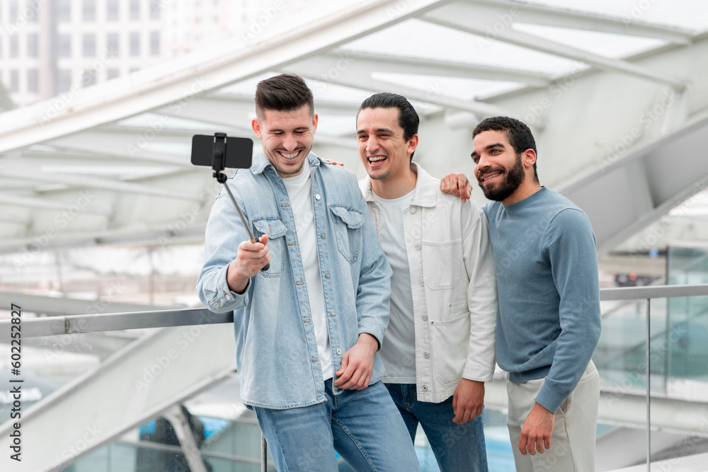 Cheerful Tourists Men Making Selfie On Phone In Airport