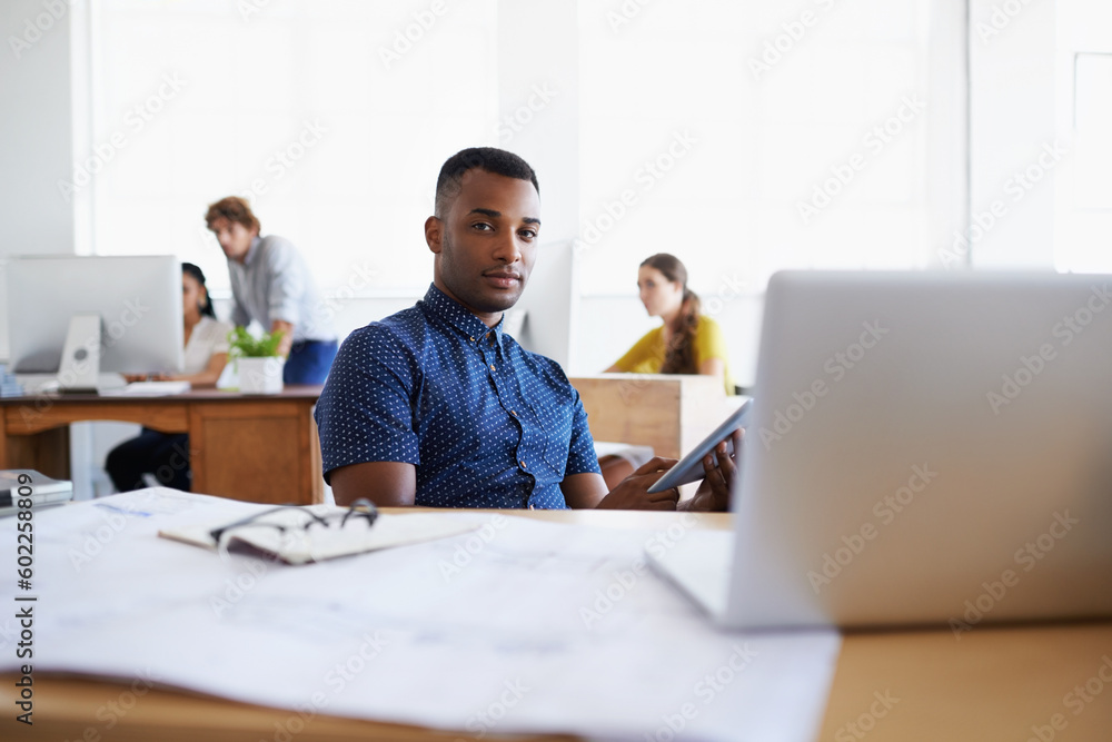 Tablet, architect or portrait of black man in office for engineering project or online research. Architecture, digital or designer typing on web app for floor plan development or building blueprint Tablet, architect or portrait of black man in office for engineering project or online research. Architecture, digital or designer typing on web app for floor plan development or building blueprint