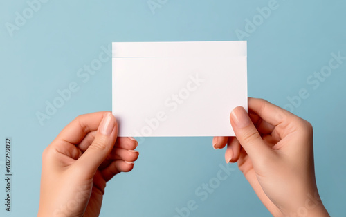 Mockup message card with female hand fingers. Concept suitable for online shop advertising, mockup corporate and freelance marketing and promotion and business.