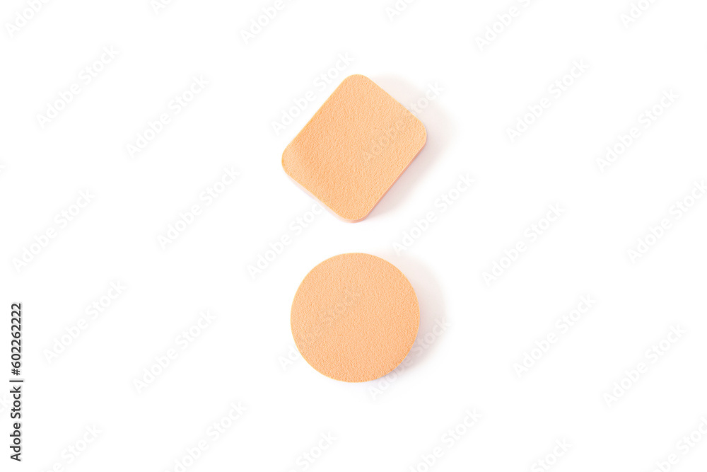 Beauty sponges for applying makeup on a white background. Top view, flat lay Beauty sponges for applying makeup on a white background. Top view, flat lay