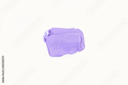 Light lilac smear on a white background. Top view, flat lay