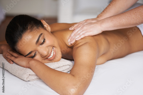 Happy woman, eyes closed or hands for back massage to relax for resting or wellness physical therapy. Smile, sleeping or girl in salon for body healing or natural holistic detox by masseuse