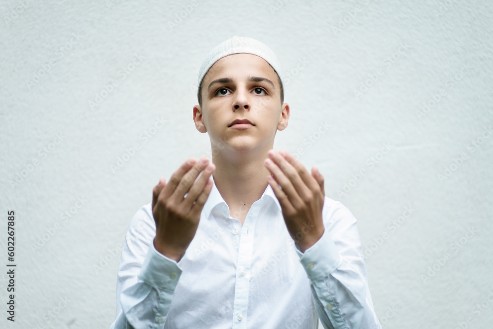 portrait of a Muslim believer isolated on a white background portrait of a Muslim believer isolated on a white background