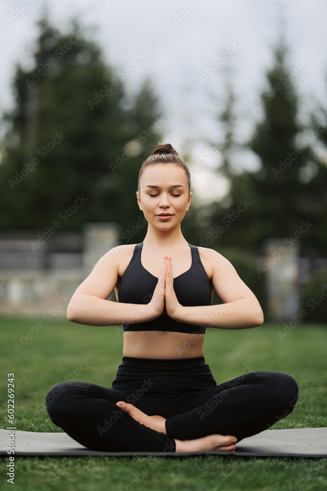 Young american woman meditating in nature Young american woman meditating in nature